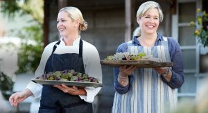 ladies carrying trays