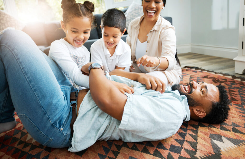 closeup of a young hispanic family playing togethe 2025 04 06 11 47 57 utc