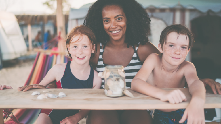 Travel nanny helping family with children during vacation travel